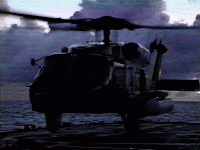 HH-60J Preparing to depart at night underway with no lights.
